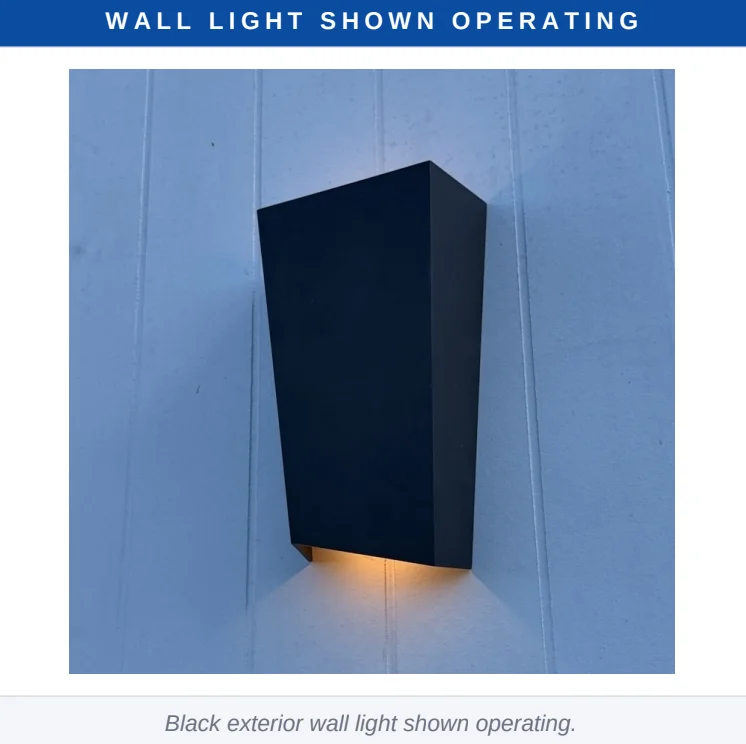 Black exterior wall light at a Five Dock property shown operating